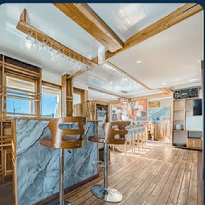 Indoor lounge and bar on board the KLM New Pandawa