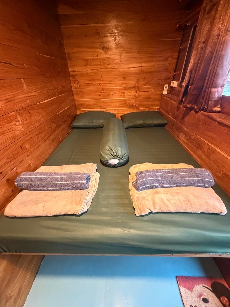 KLM Berkah Bersama — Private room — double bed with towel — Lombok to Labuan Bajo budget open trip 4D3N