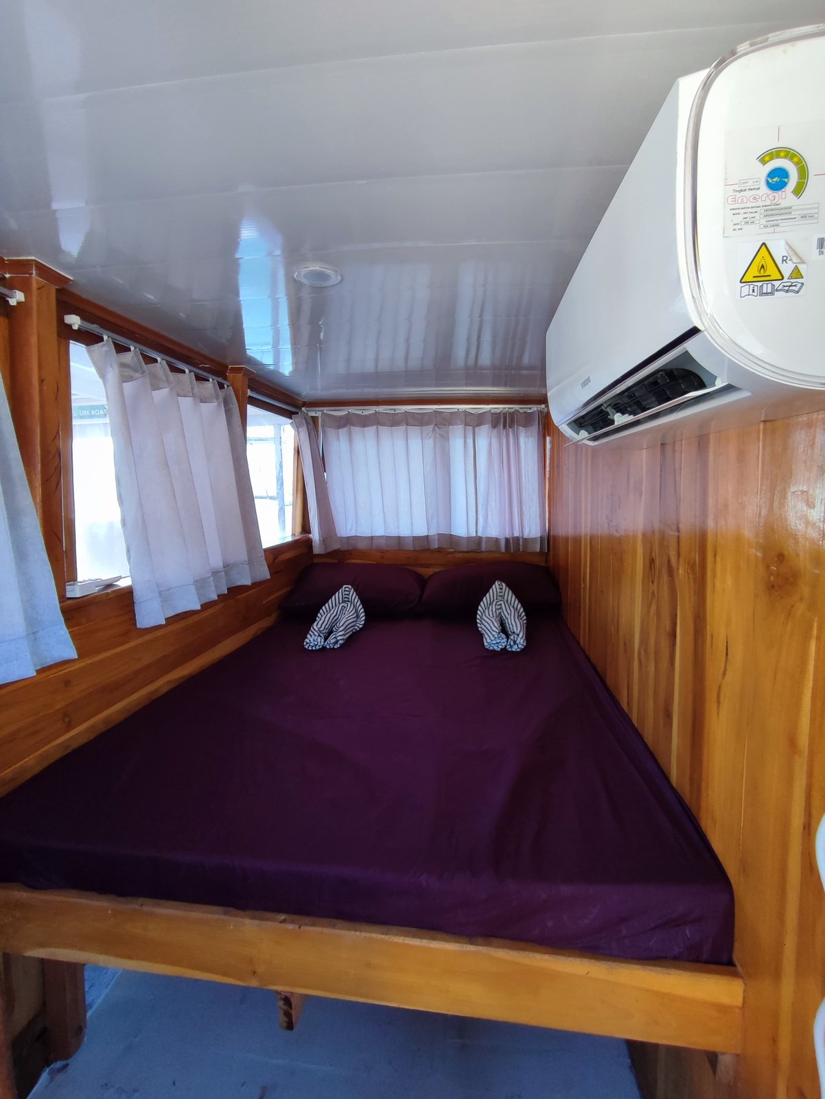 KLM Budi Jaya — Private room — double bed with AC — Lombok to Labuan Bajo budget open trip 4D3N