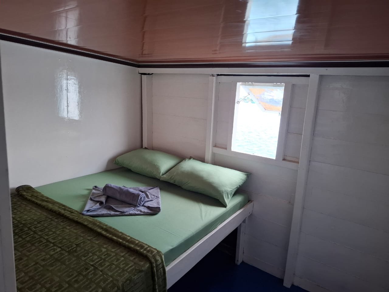 Private room — double bed with AC — Labuan Bajo to Lombok budget open trip 4D3N